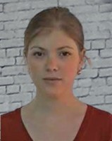 Zoe Chase Blonde woman with her hair pulled back